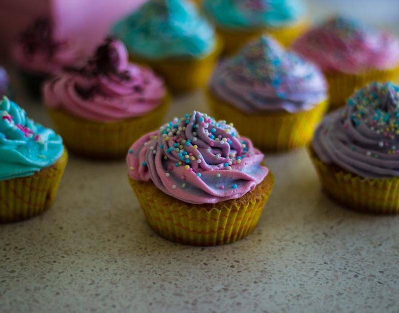 10-Minute Vanilla Cupcakes with Frosting & Sprinkles