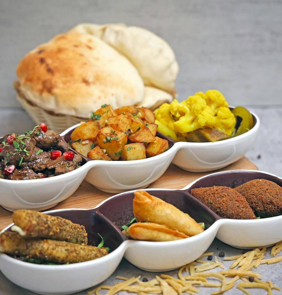 Crispy Batata Harra with Warm Pita & Sides