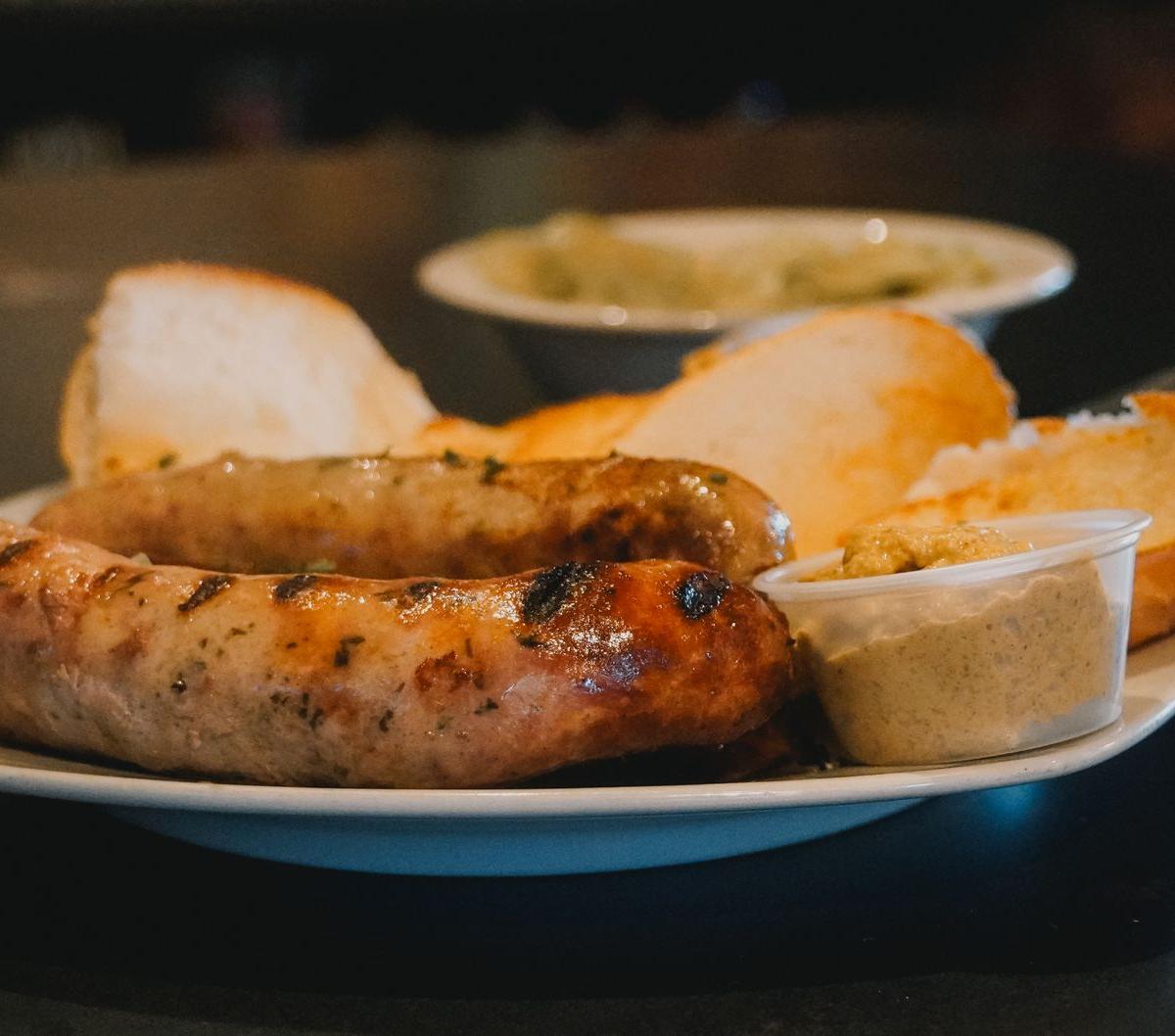Pan-Seared Biała Kiełbasa with Onions