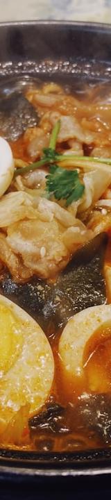 Bubbling Spicy Tofu Stew with Egg & Noodles