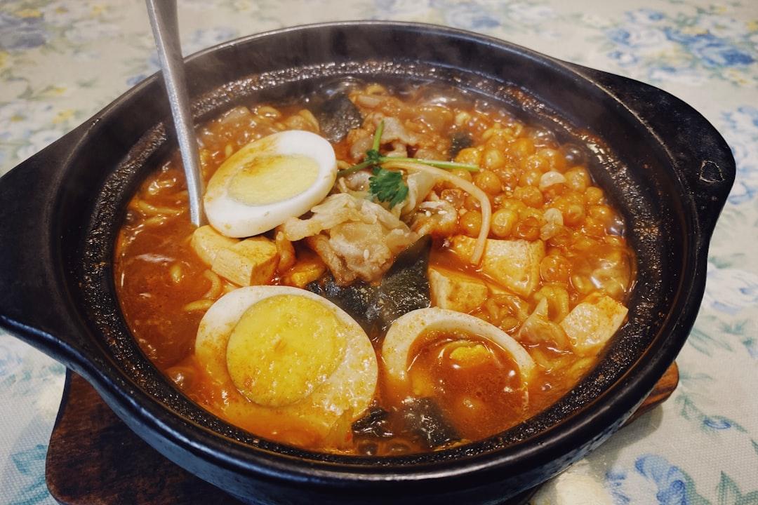 Bubbling Spicy Tofu Stew with Egg & Noodles
