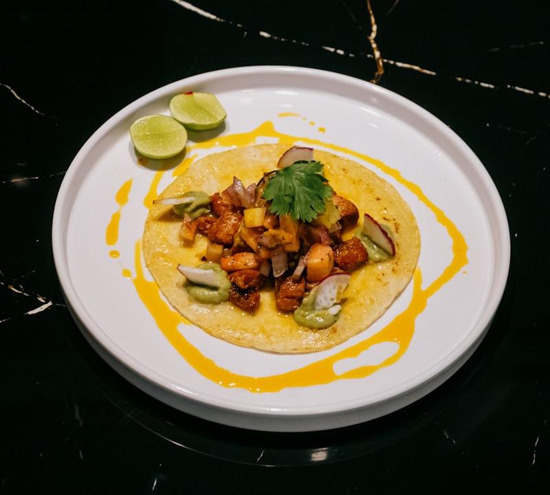 Charred Marlin Tacos with Lime Crema