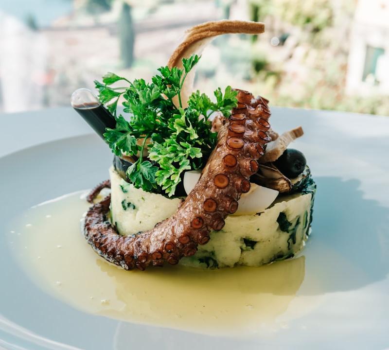 Charred Octopus with Herbed Potatoes & Olives