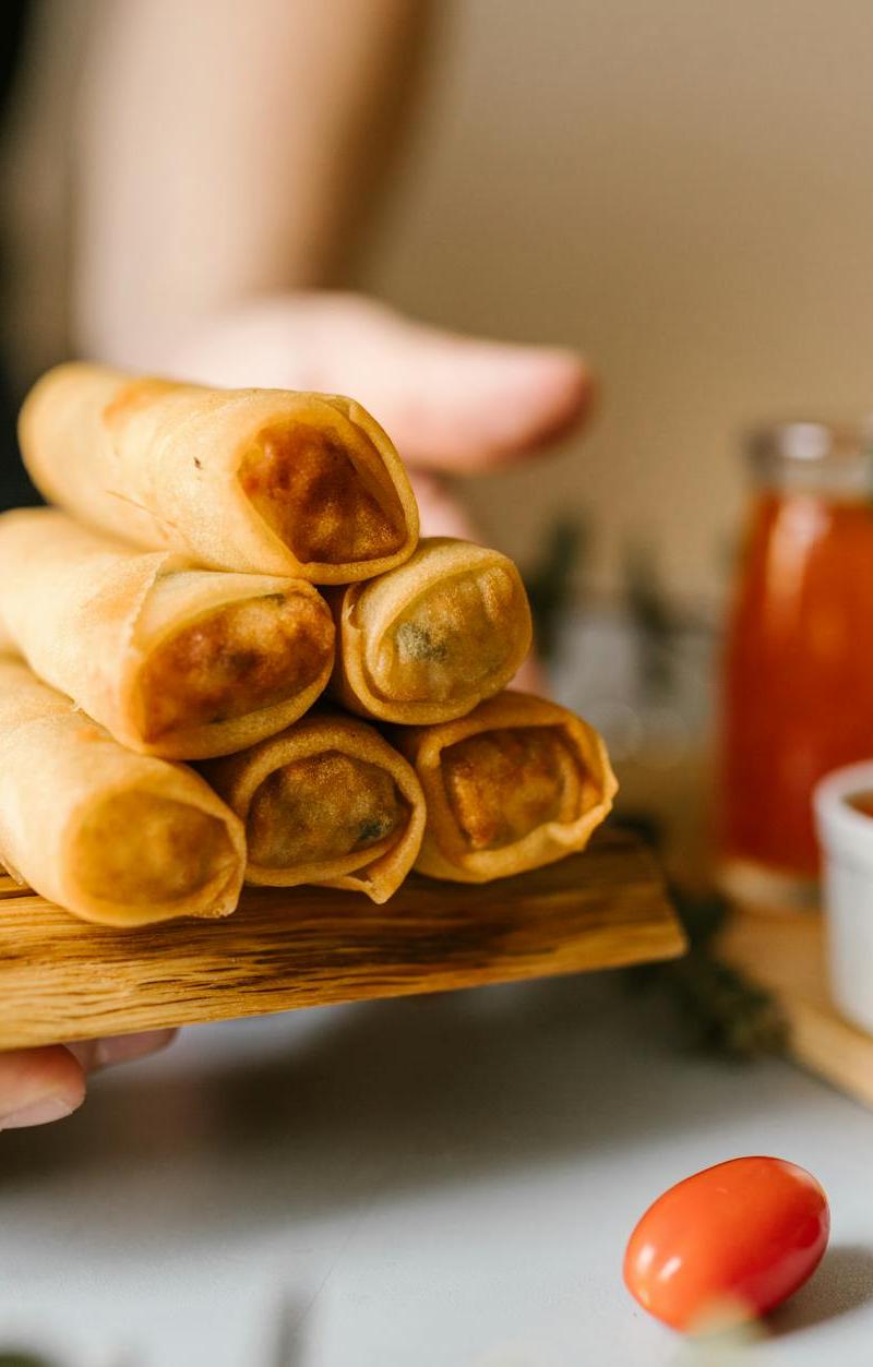 Crispy Boudin Egg Rolls with Hot Sauce