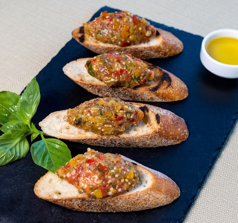Crispy Chicken Crostini with Tuscan Herb Oil