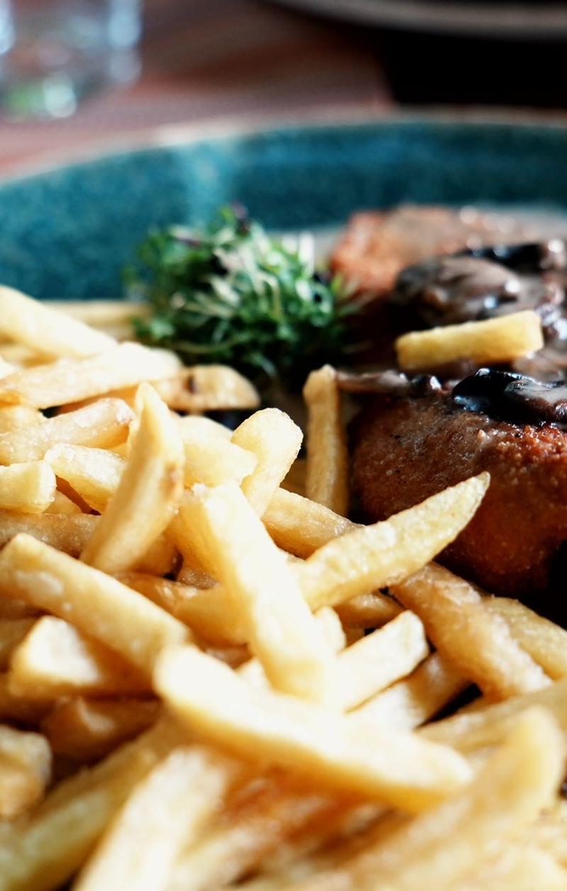 Crispy Chicken Schnitzel with Mushroom Gravy & Fries