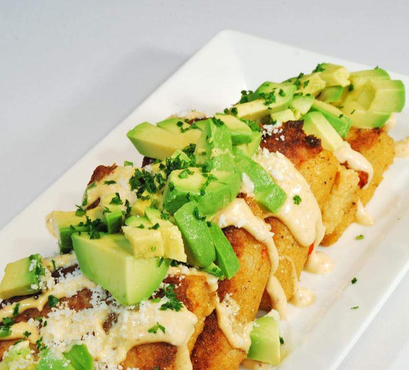 Crispy Chicken Taquitos with Lime Crema