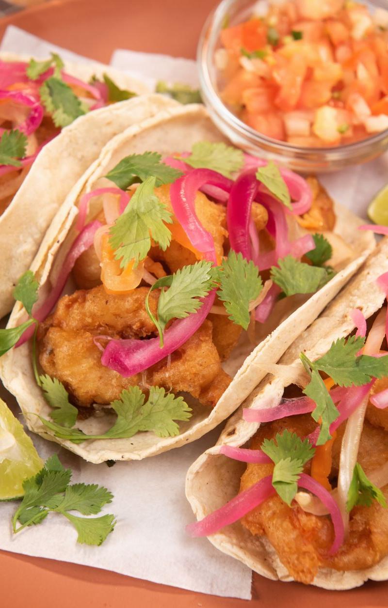 Crispy Fish Tacos with Lime Crema & Slaw