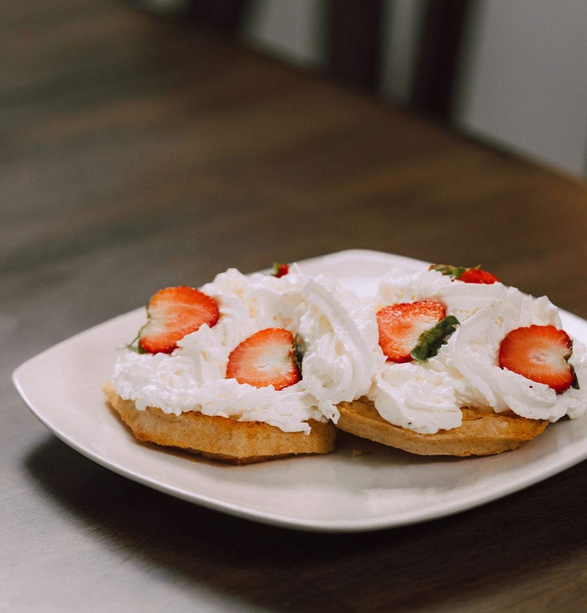 Crispy Golden Waffles with Whipped Cream & Strawberries