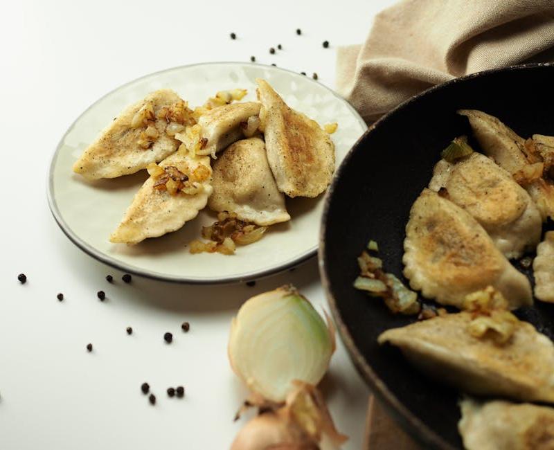 Crispy Kopytka with Caramelized Onions