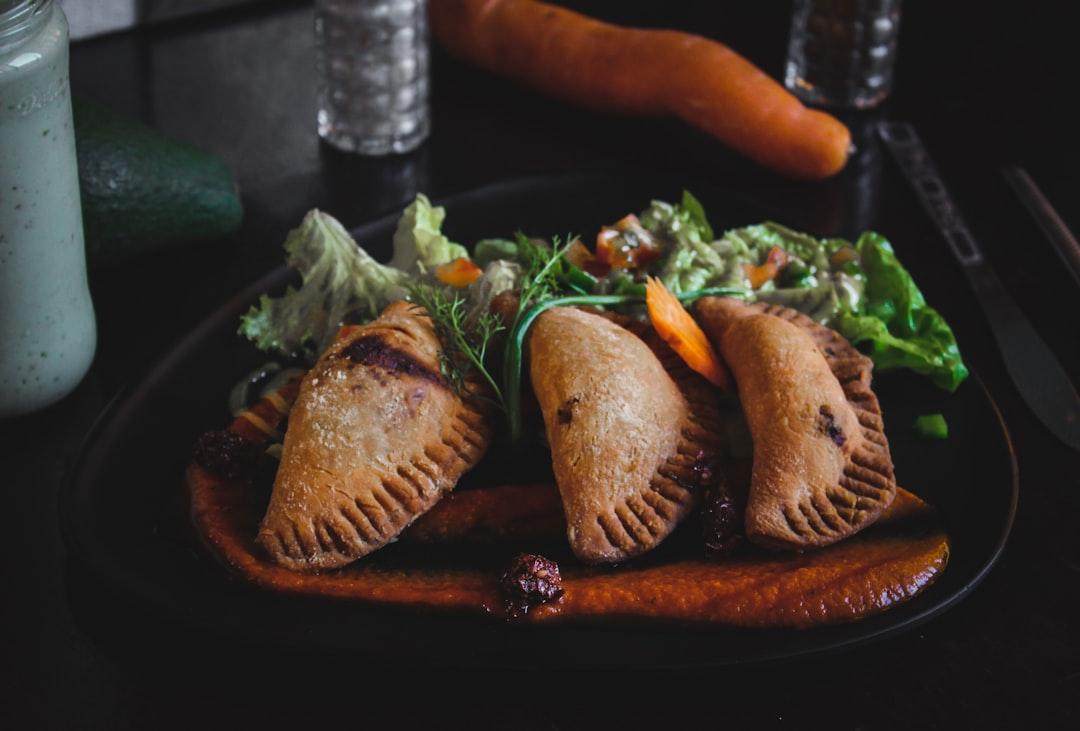 Crispy Mole Amarillo Empanadas with Green Salad