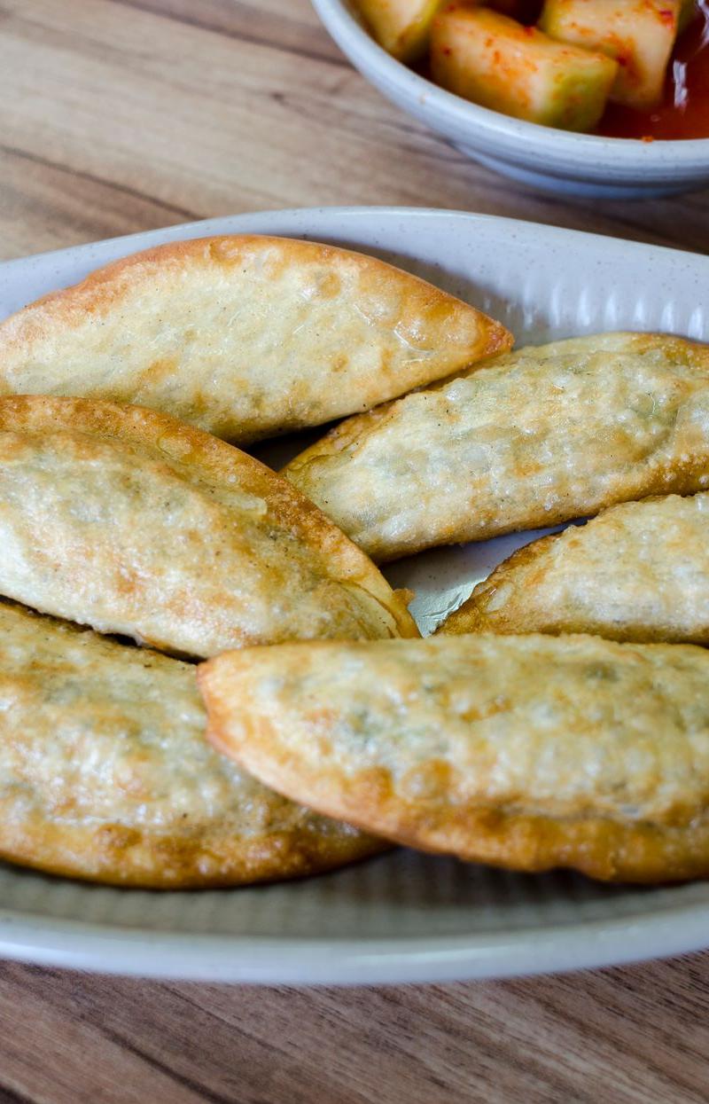 Crispy Pan-Fried Pork Gunmandu with Pickled Radish