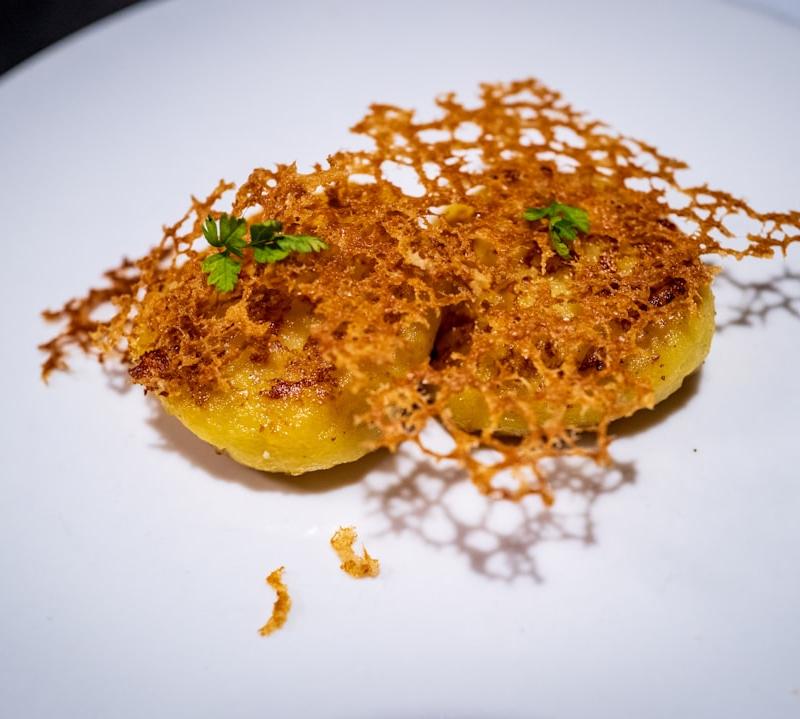 Crispy Pork Tostones with Melted Cheese