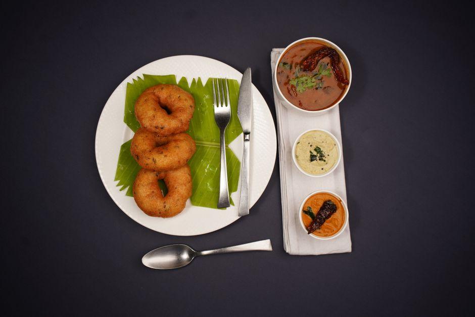 Crispy Vada in Spicy Rasam with Coconut Chutney