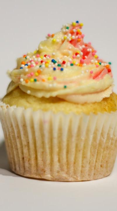 Frosted Vanilla Cupcakes with Sprinkles
