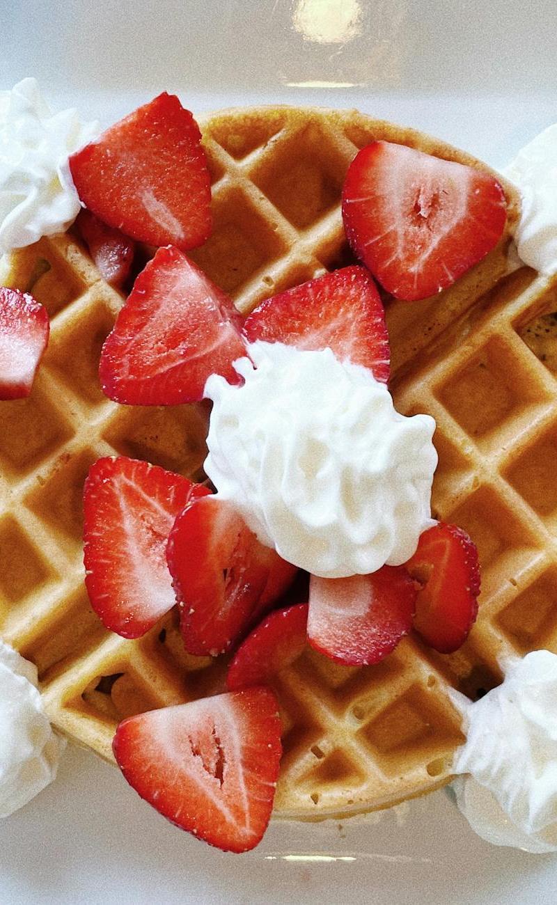 Golden Crispy Waffles with Whipped Cream & Strawberries