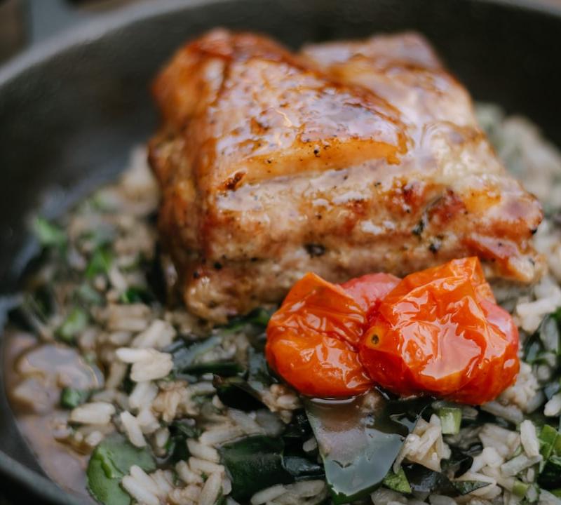 Greek Spinach Rice with Crispy Pork & Roasted Tomatoes