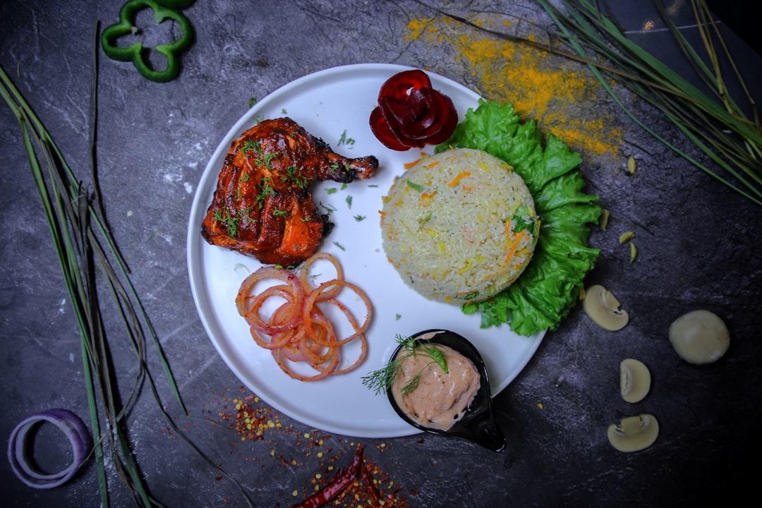 Green Rice Chicken with Crispy Onions & Crema