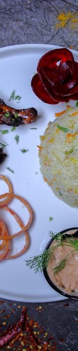 Green Rice Chicken with Crispy Onions & Crema