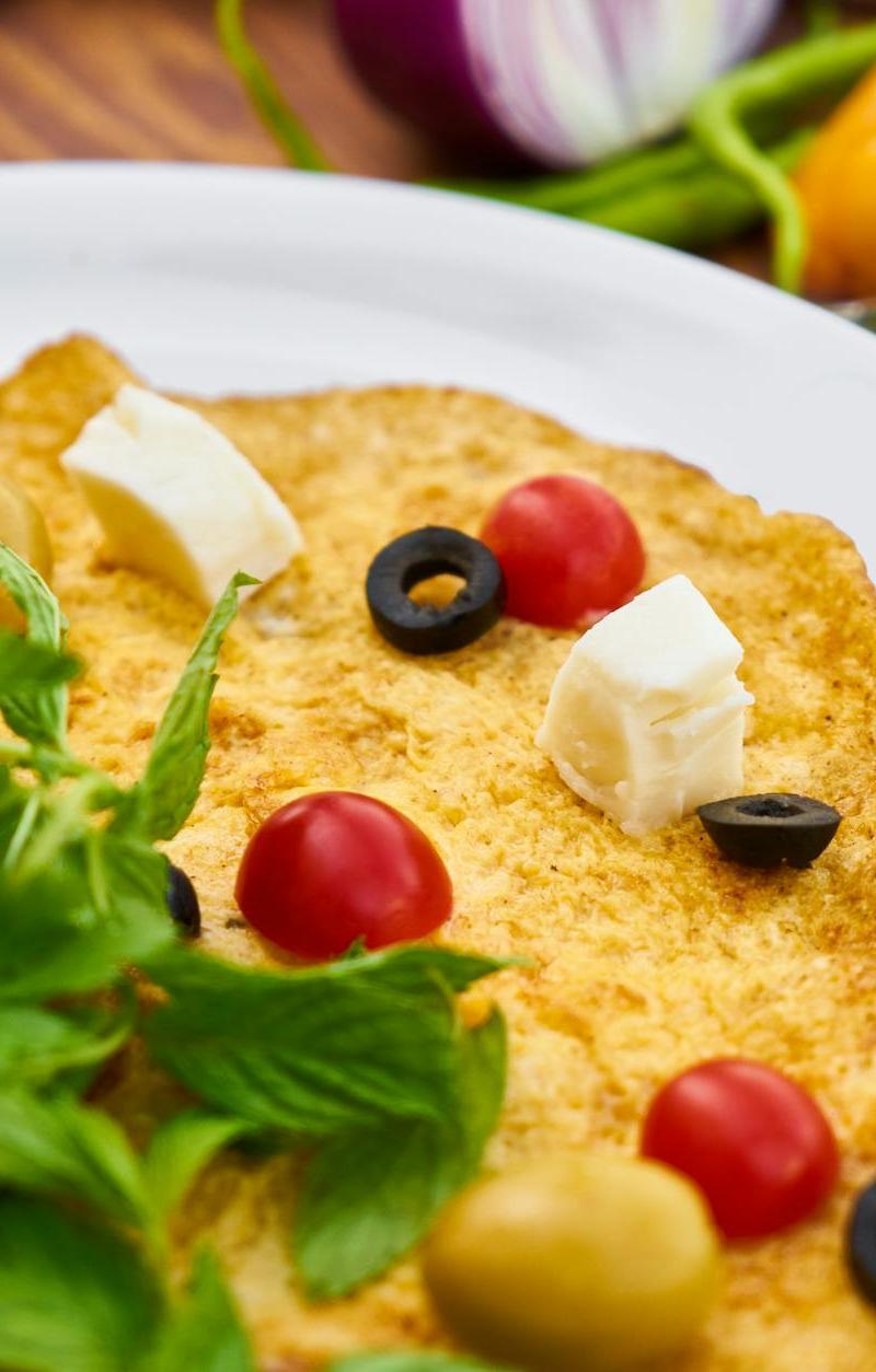 Herby Feta Omelette with Warm Tomato Salad
