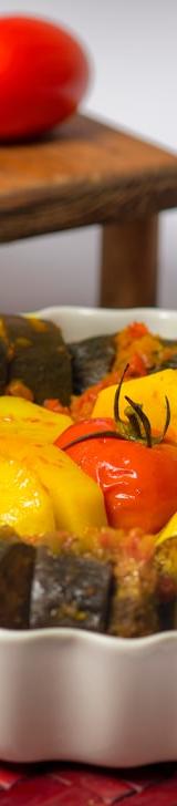 Herby Stuffed Eggplant with Crispy Potatoes