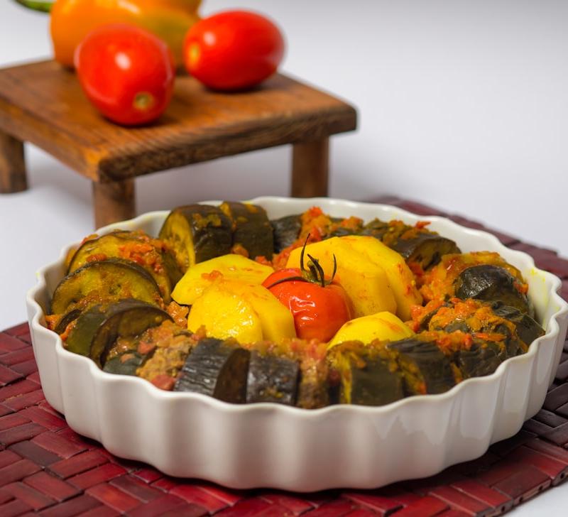 Herby Stuffed Eggplant with Crispy Potatoes
