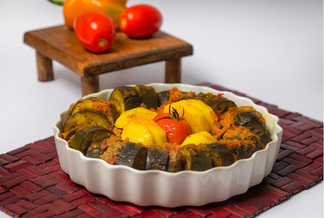 Herby Stuffed Eggplant with Crispy Potatoes