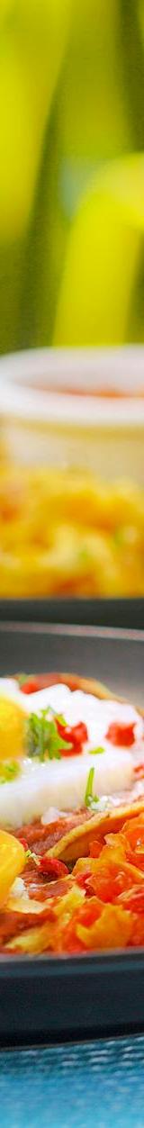 Huevos Motuleños: Crispy Tortilla Stack