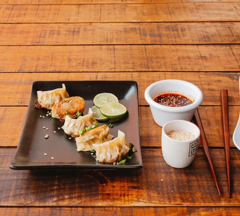 Pan-Fried Shrimp and Fish Dumplings with Peanut Sauce