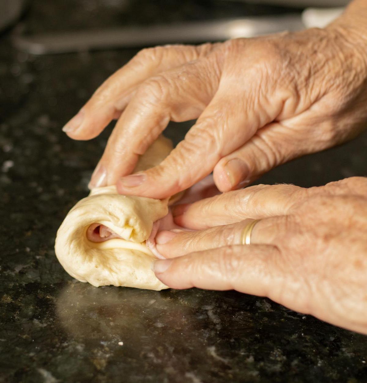 Jachnun Roll with Tomato Sauce
