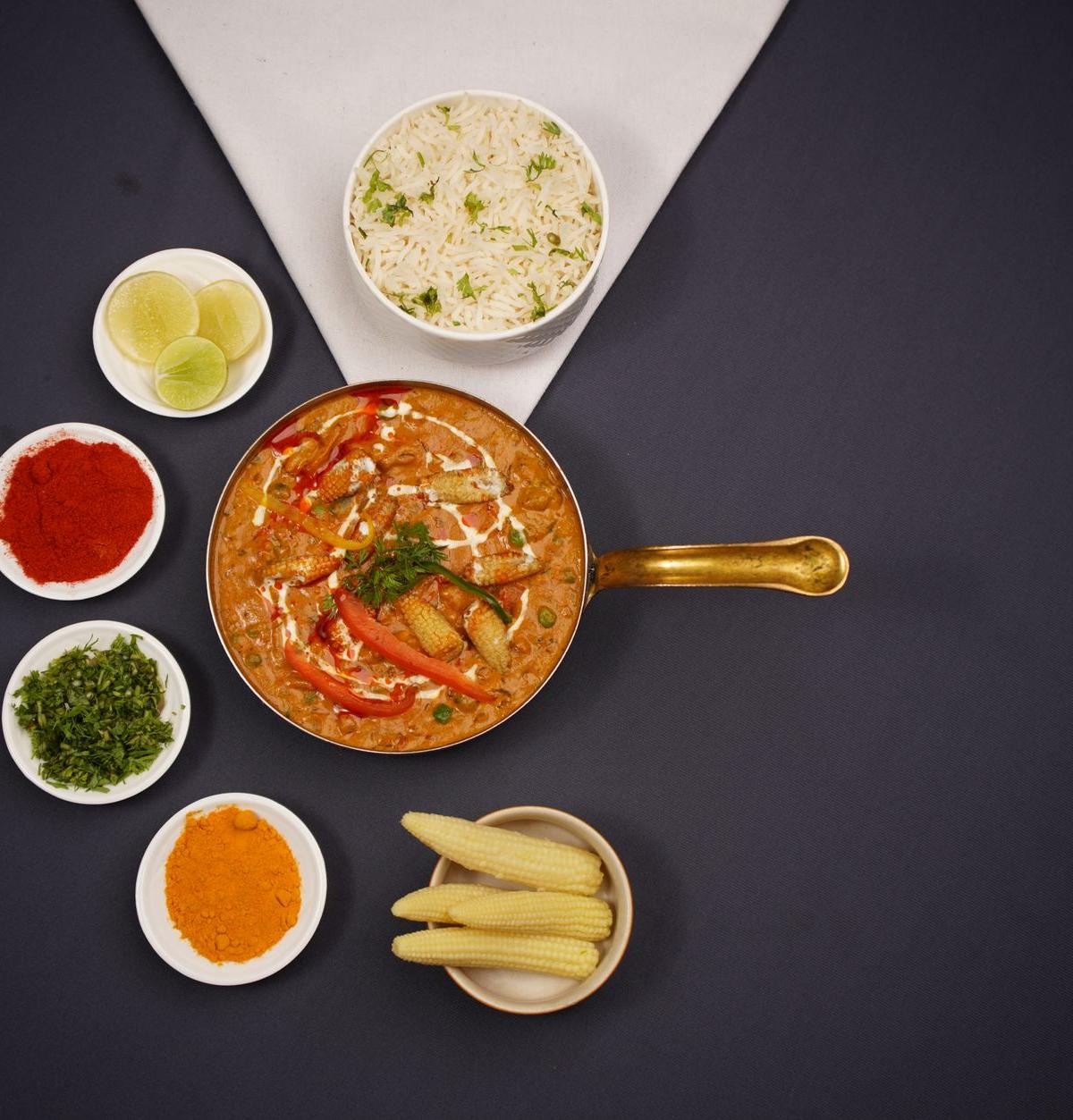 Golden Paneer in Turmeric Tomato Sauce with Jeera Rice