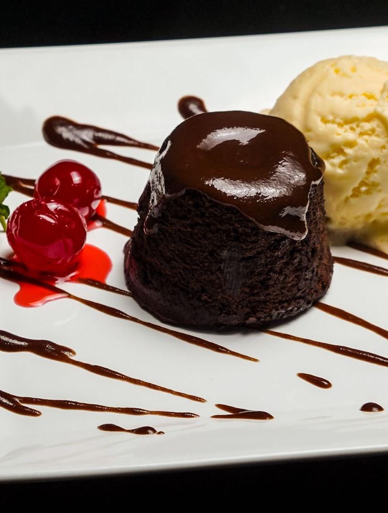 Molten Chocolate Cake with Ice Cream & Cherries