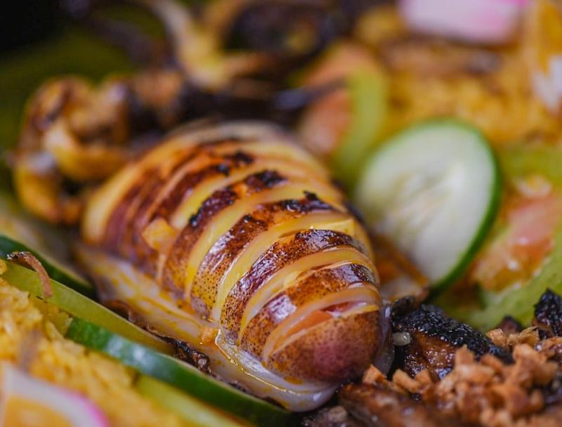 Nasi Kuning with Grilled Squid & Fresh Sides