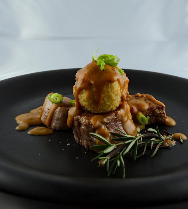 Pan-Fried Potato Dumplings with Pork & Gravy