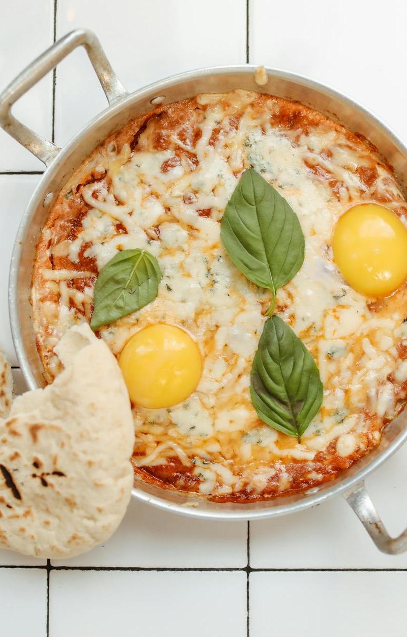 Shakshuka—Baked Eggs in Tomato Sauce & Pita