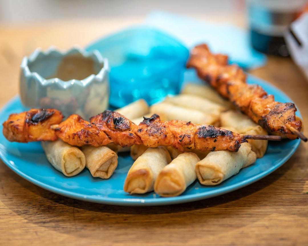 Sheet Pan Chicken Satay with Spring Rolls