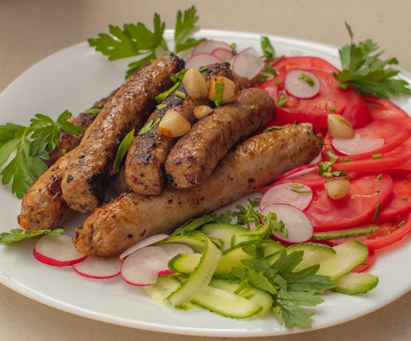 Sheet-Pan Nürnberger Bratwurst with Caramelized Onions