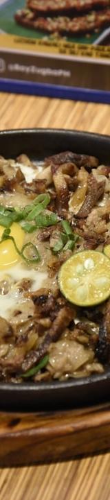 Sizzling Pork Sisig with Crispy Egg