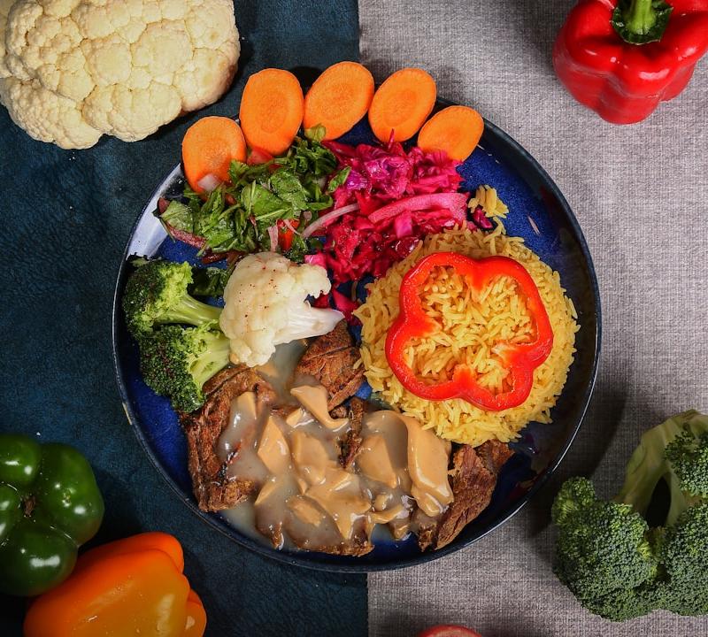 Smothered Pork Chops with Rice & Veggies