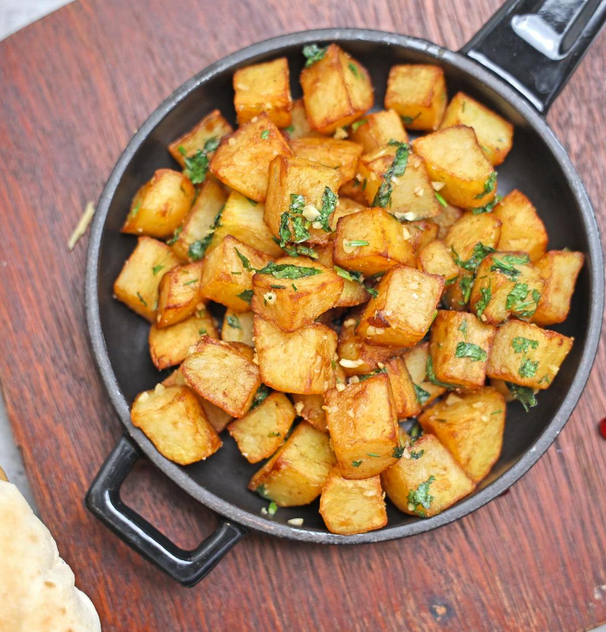 Spicy Batata Harra with Pita & Pomegranate
