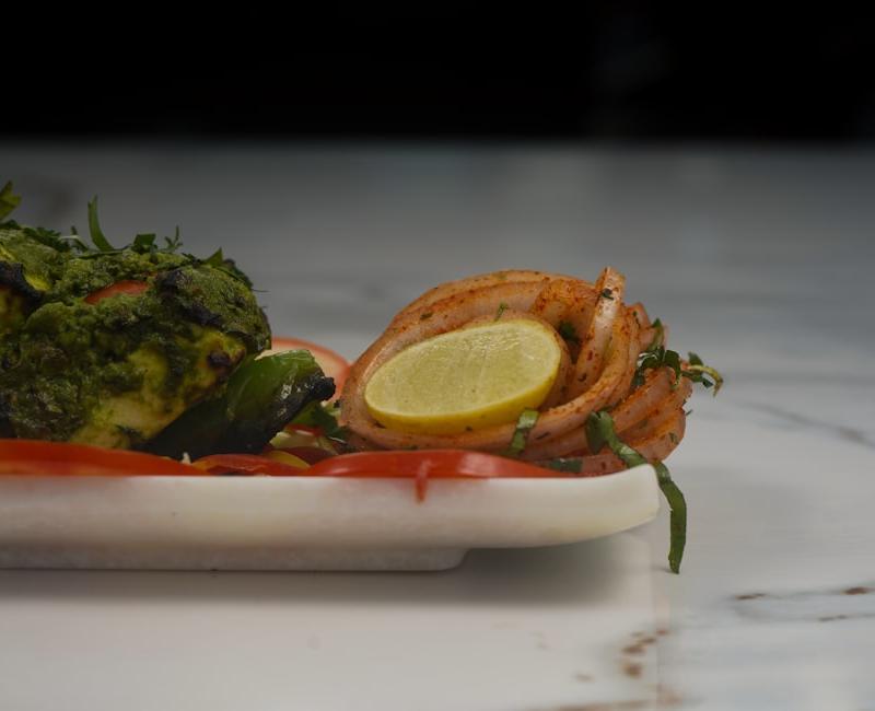 Charred Tandoori Pomfret with Green Chutney