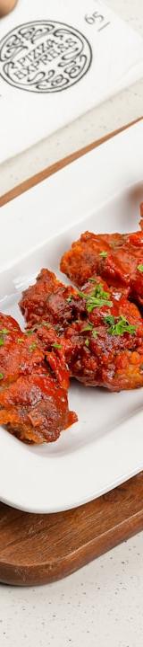 Baked Cajun Wings with Green Sauce