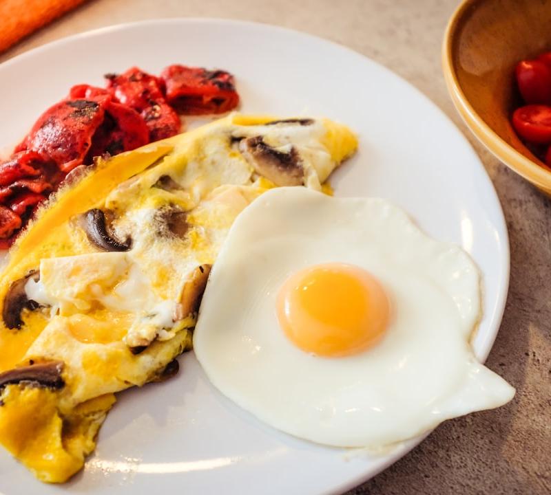 Butter-Mushroom Omelet with Roasted Peppers & Tomatoes